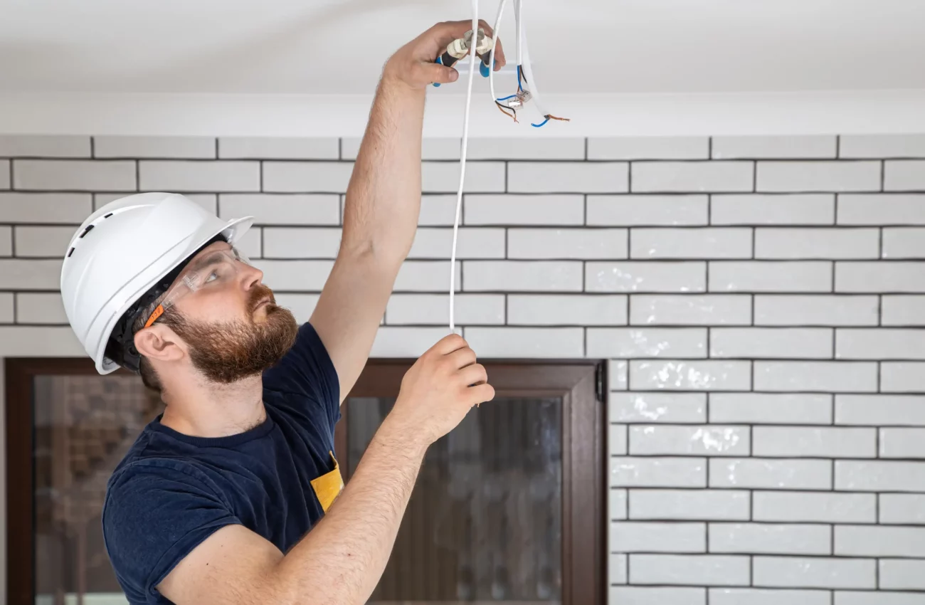 professional-overalls-with-tools-background-repair-site-home-renovation-concept-scaled-1.webp